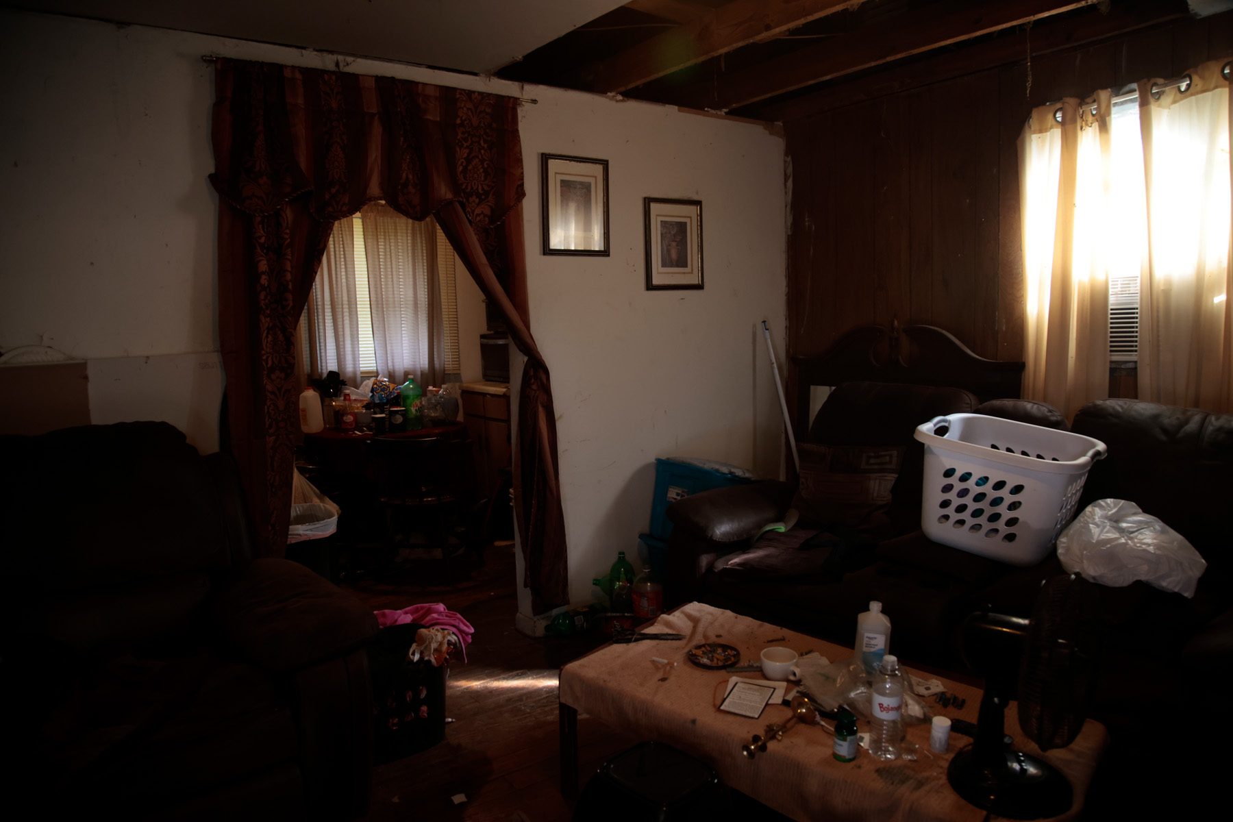 A picture of the inside of a salkehatchie site. The room is cluttered and dark.