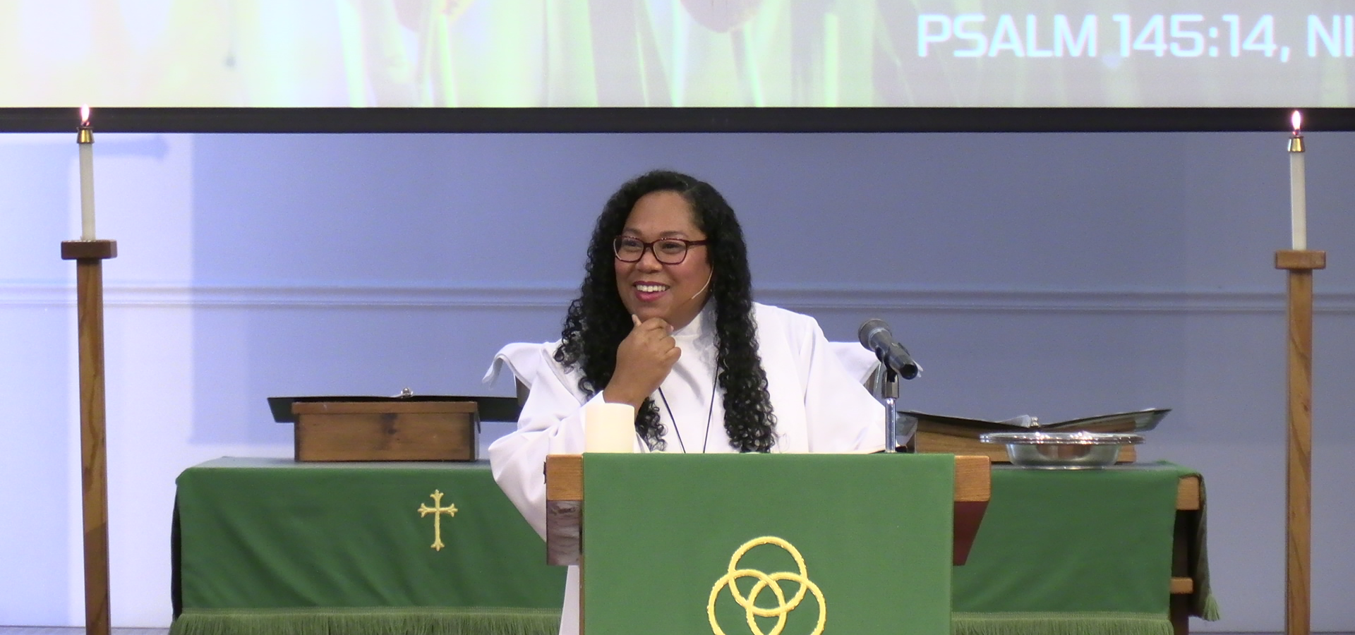 Pastor Antoinette preaches during a worship service
